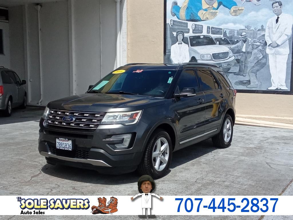 2016 Ford Explorer XLT in White — front three-quarter view