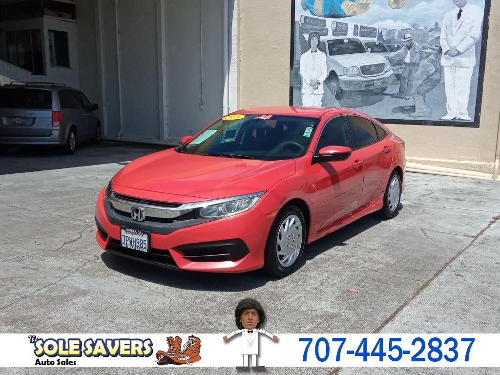 2016 Honda Civic LX in Red — front three-quarter view