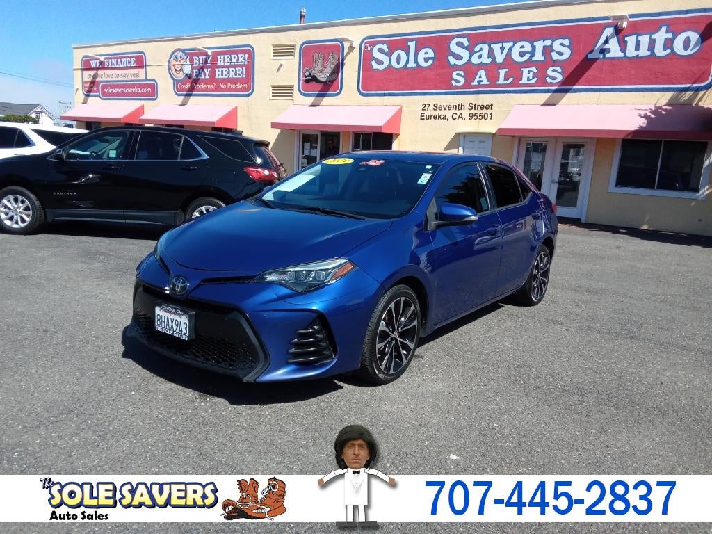 2019 Toyota Corolla SE CVT (Natl) in Blue — front three-quarter view