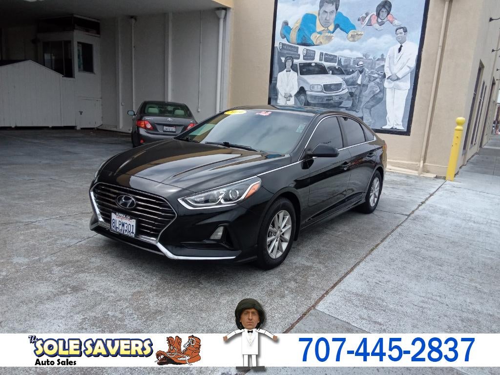 2019 Hyundai Sonata SE in Phantom Black — front three-quarter view