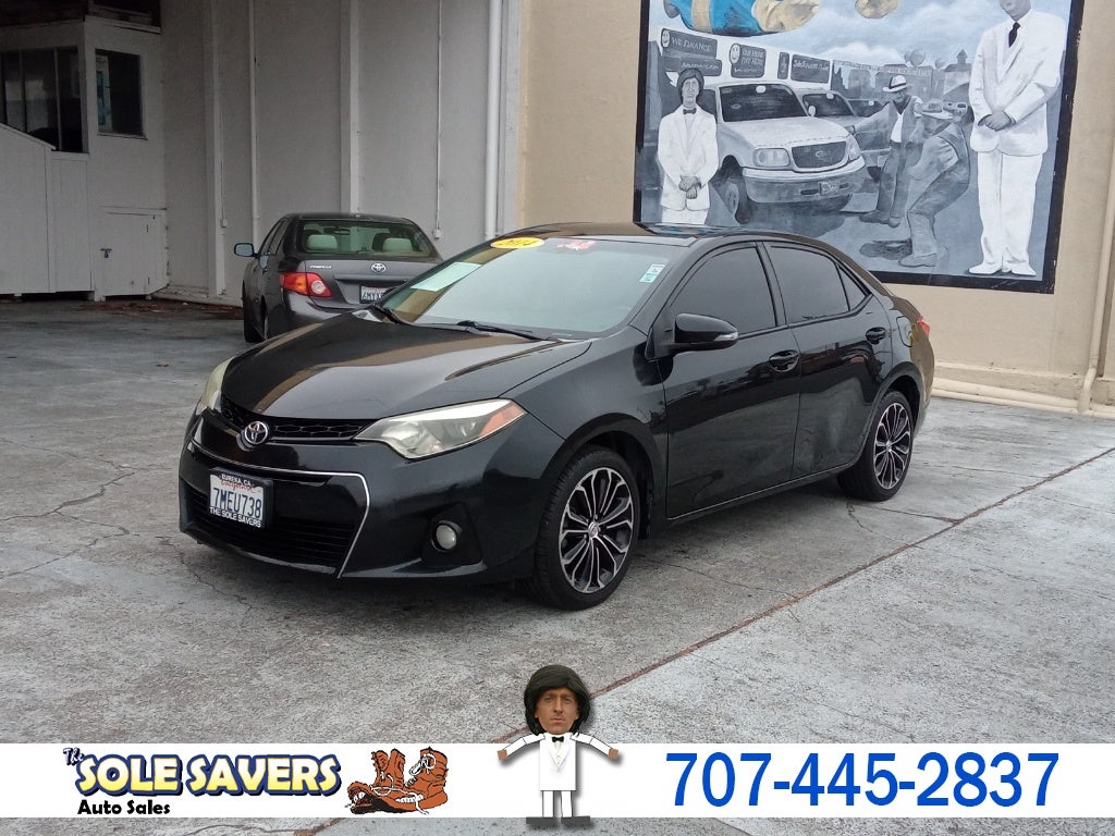 2014 Toyota Corolla 4dr Sdn CVT Auto S Plus (Natl) in Black — front three-quarter view