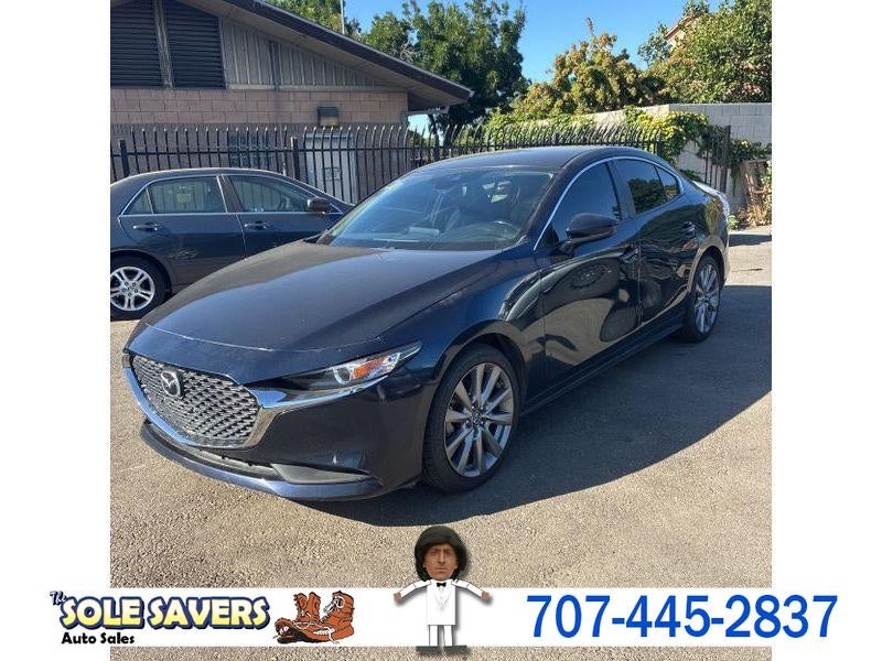 2021 Mazda Mazda3 Base in Dark Blue — front three-quarter view