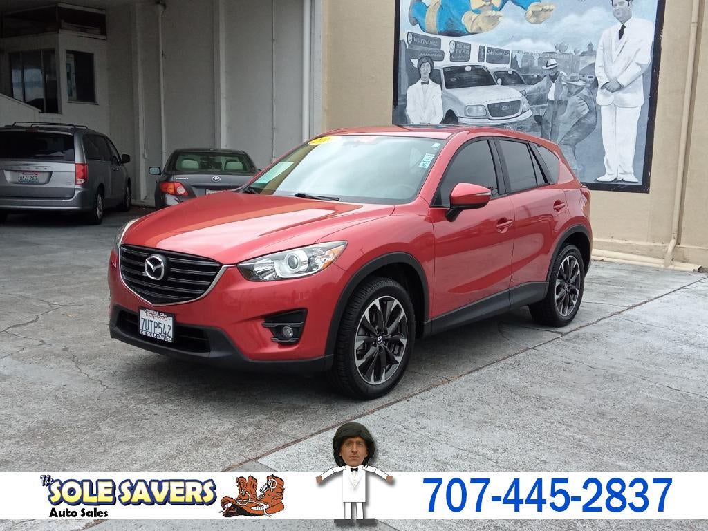 2016 Mazda Mazda CX-5 Grand Touring in Red — front three-quarter view